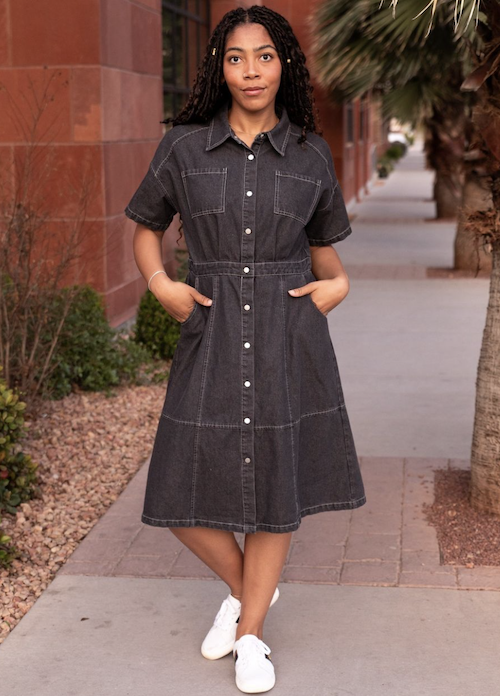 Woman outside wearing a button up dress